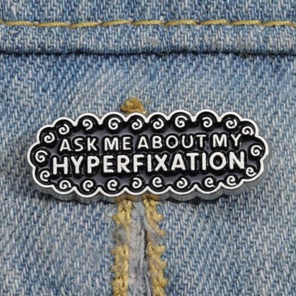 “Ask Me About My Hyperfixation” Swirly Metal Pin - Picture 1 of 4